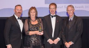 Shamba's owners Anne Gray and her husband Martin (far right) are congratulated by judges