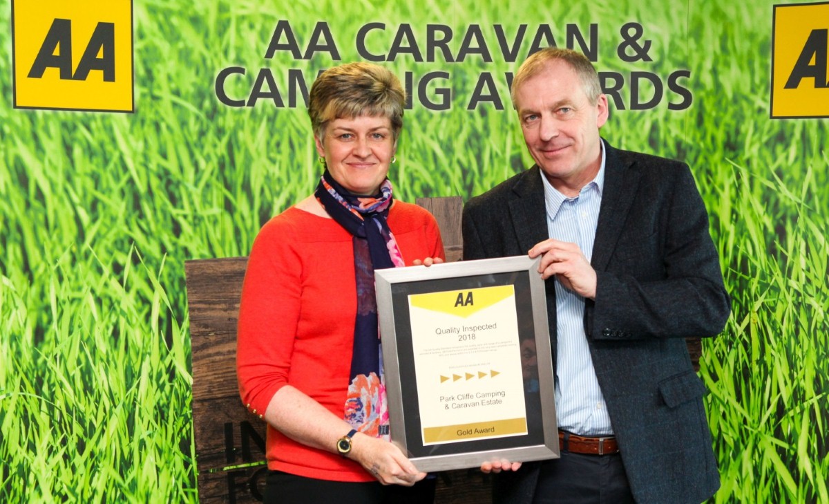 David Hancock, AA Caravan and Camping Coordinator, congratulates Susan Dickson on her park's success