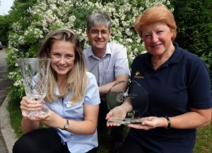 Trophy triumph: Green-fingered Kim Hodson-Walker (right) with the park's Michael Holgate and Ellen Cartwright