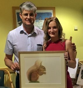 Melissa Elizabeth with Michael Holgate of Silverdale holiday park where the exhibition was staged