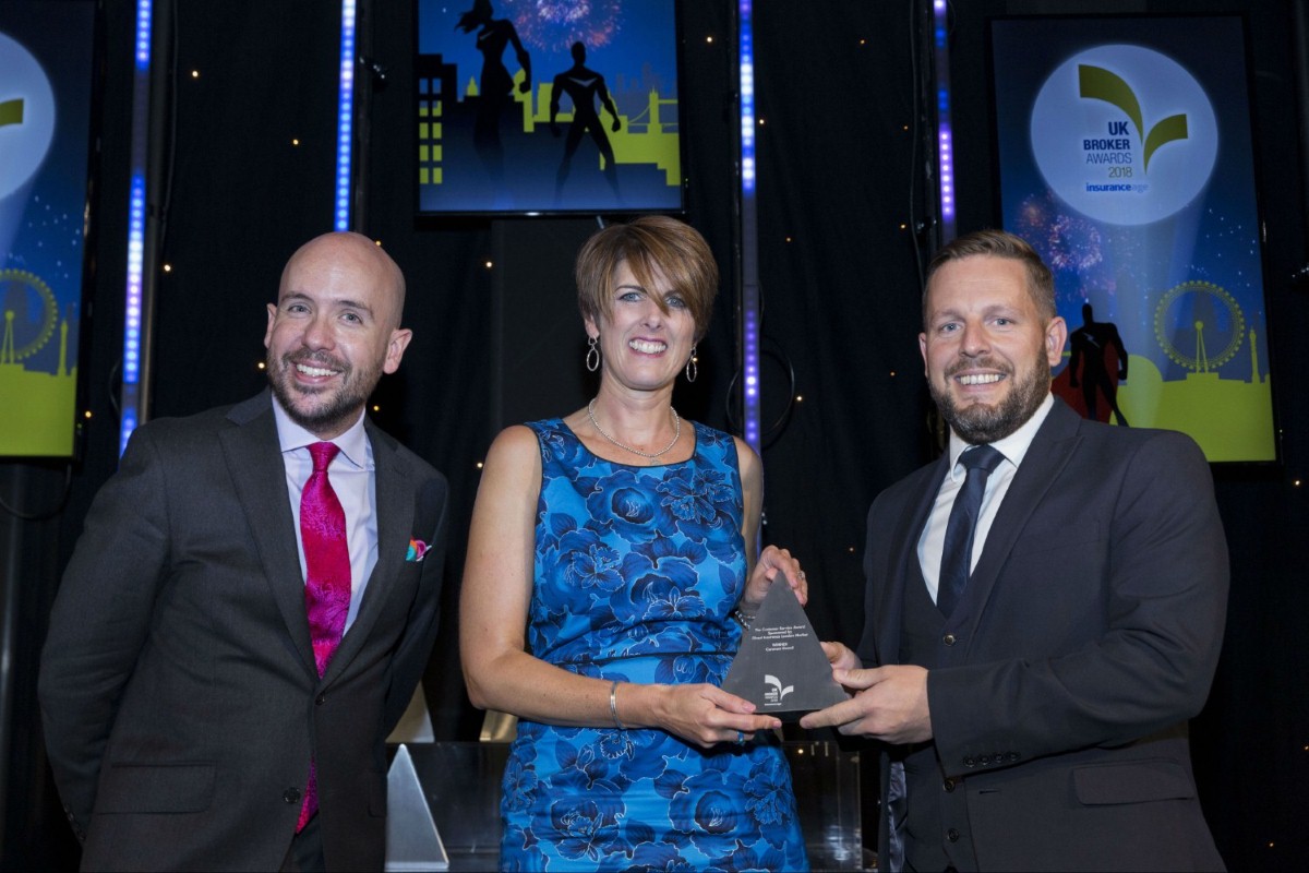 Smiles all round at the Caravan Guard team take home the gold