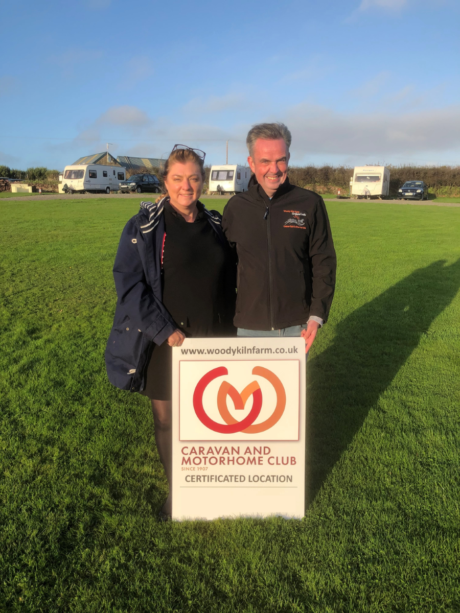 Sharon and Dean gleam as they take the CL of the year award