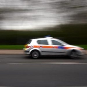 The police car was clocked at more than twice the National Speed Limit