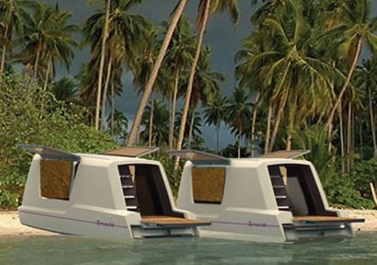 The Thansadet is capable of turning from a car-pulled touring caravan to a floating houseboat