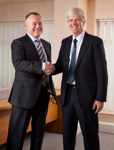 Peter Smith Chairman of Swift Holdings UK (right), welcomes James Buckley as the CEO of Swift Group .
