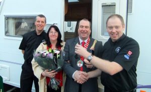 Staff of the new Stowford Caravan Centre hand over keys to their first customers