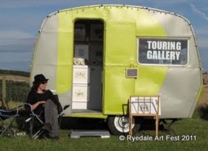 This mini art gallery was made from a 1960s Sprite caravan