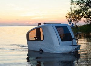 This 380kg microcaravan comes with an outboard motor