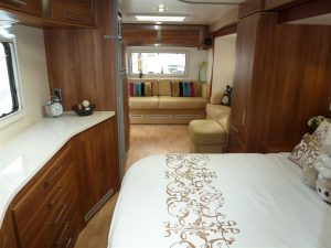 The Inos 1211 features a spacious transverse fixed double bed layout