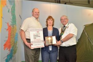 Site owners Adrian and Alison Smith (left and centre) accept their award