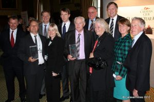 Tony and Maria Potts (front centre) won this year's top award