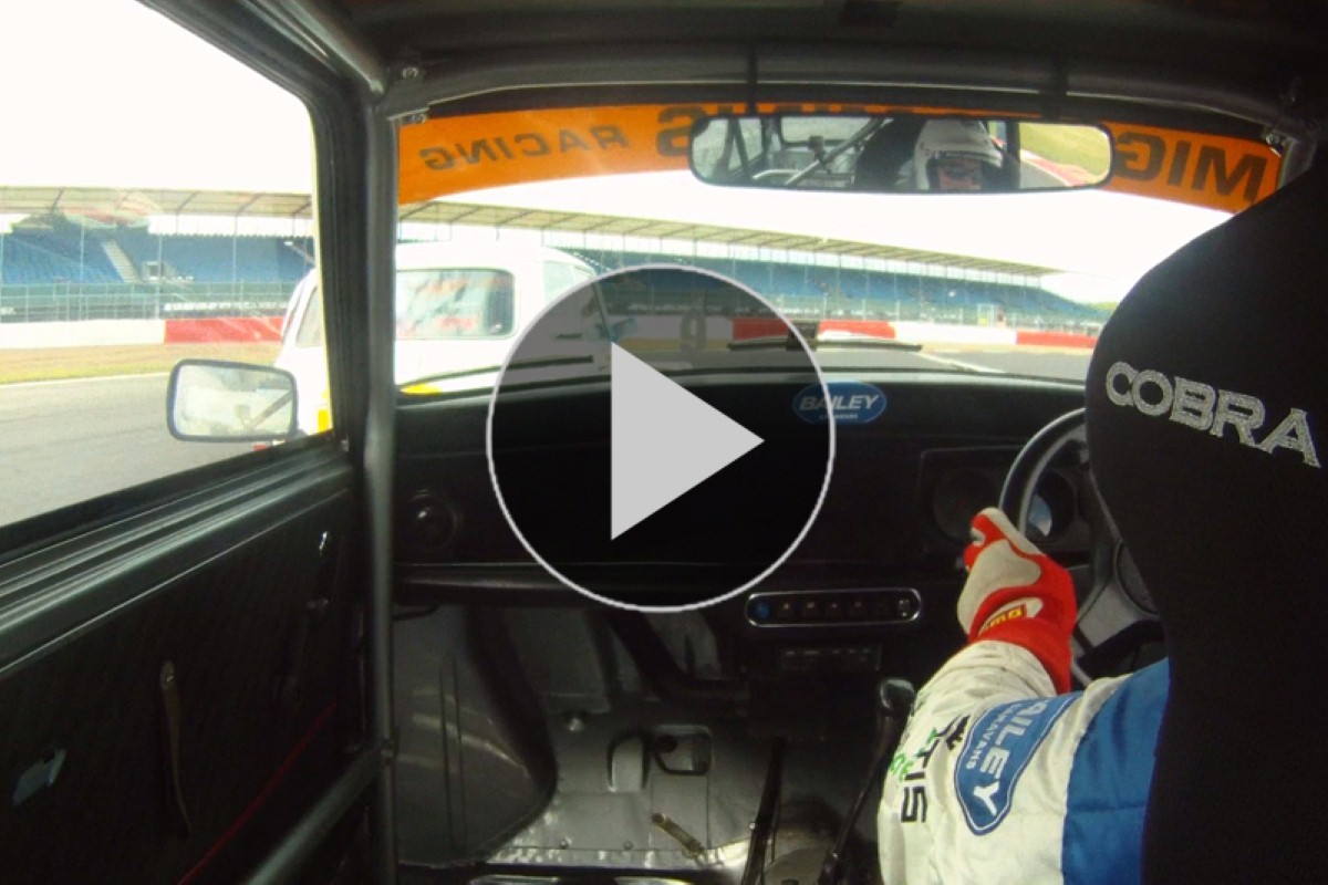 Jonathan prepares to overtake one of his Mini racing rivals
