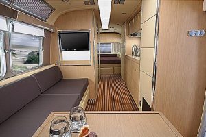 The interior of the land yacht which features high-lustre teak to give the impression of a boat deck