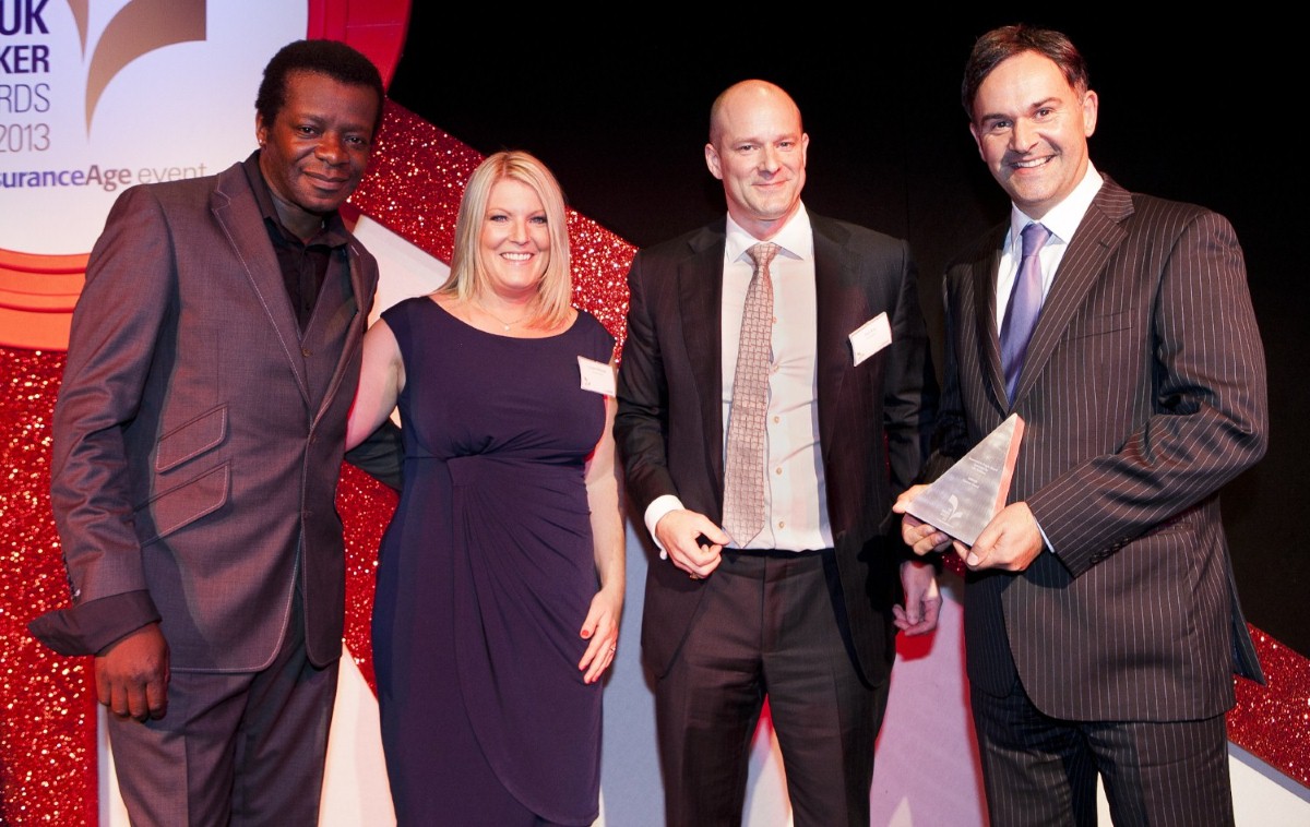 Comedian Stephen K. Amos (left) presented Caravan Guard with the award