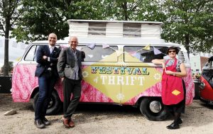 Wayne and company pose in front of Max McMurdo's custom upcycled caravan