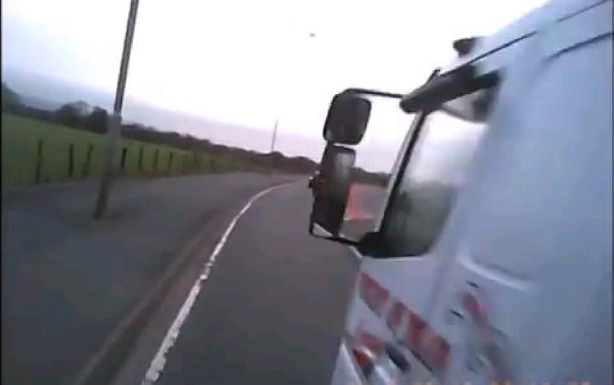 A flat-bed truck narrowly missed the cyclist on the A59 in Lancashire
