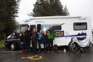 Chrissie Wellington MBE and her team pose in front of their stunning Bailey Approach Autograph 765