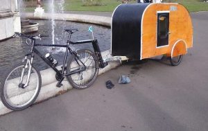 Who wouldn't want the convenience of a bicycle and a caravan?