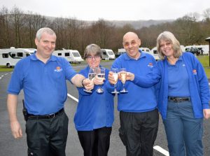 Nick and Wanda Hilditch and Steve and Debbie Hann toast the success of Llanberis Touring Park.