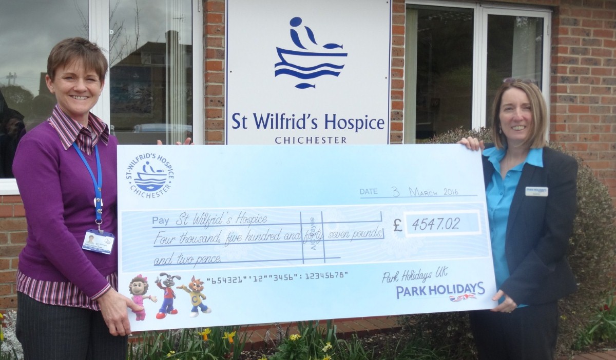 Chichester Lakeside Holiday Park's Sharon Dawes handed the cheque over to St Wilfrid's Hospice