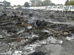 Burnt out caravans at the site. Pics from Devon & Somerset Fire Service