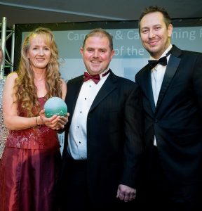 Lynette and Jamie Cook are presented with their award by (right) Mark Warnes, property and portfolio director of sponsors Hoseasons