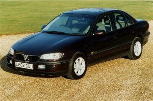 Police are searching for the occupants of a dark-coloured Vauxhall Omega such as this one
