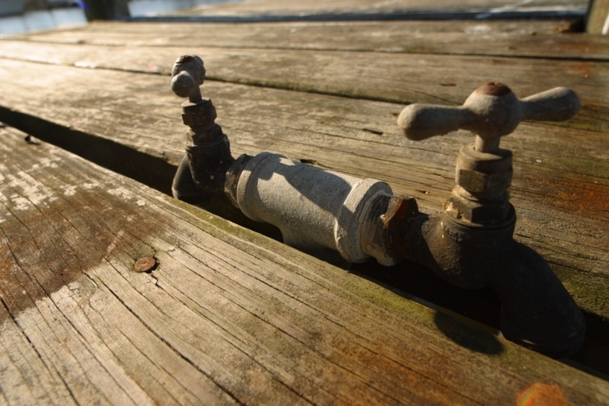 The owner claims a mains pipe left him with a bill of Â£200,000