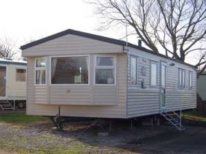 Kevin Hall towed a static caravan like this (pictured) for a mile, leaving scrapes in the road behind him