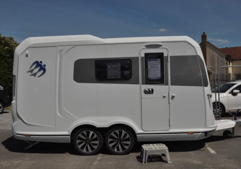 A Knaus Deseo caravan parked up