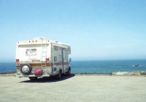 A motorhome parked up overlooking the sea