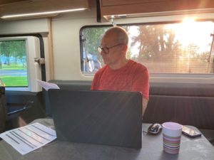 Nick working in his caravan