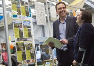 Salop Leisure’s holiday homes trade associate director Dave Attfield with a customer at a previous West Midlands Caravan & Motorhome New Model Show.