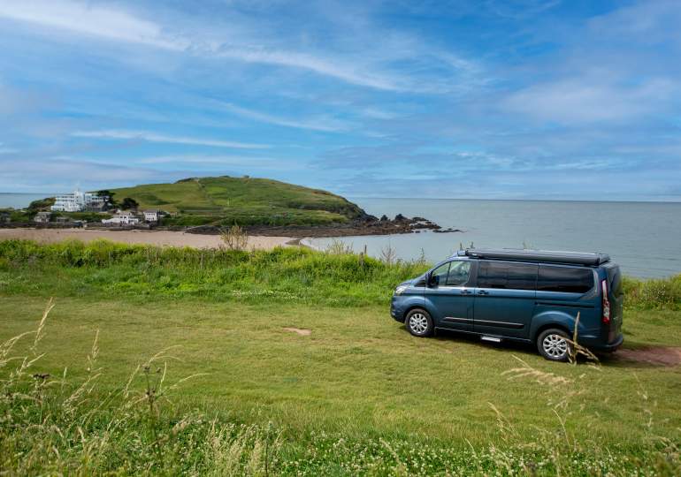An Auto-Sleeper Air parked up by the sea