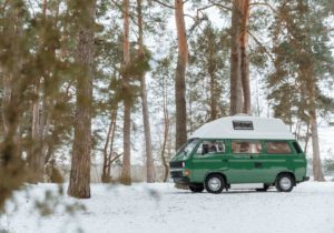 A campervan parked up in the snow