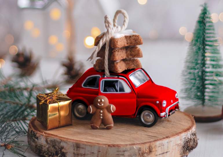 A toy car with Christmas biscuits