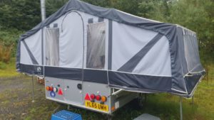 A folding tent in action