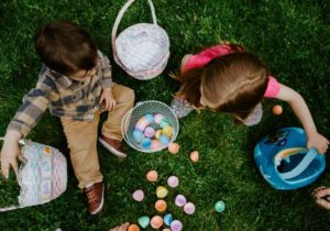 Children with baskets of Easter eggs