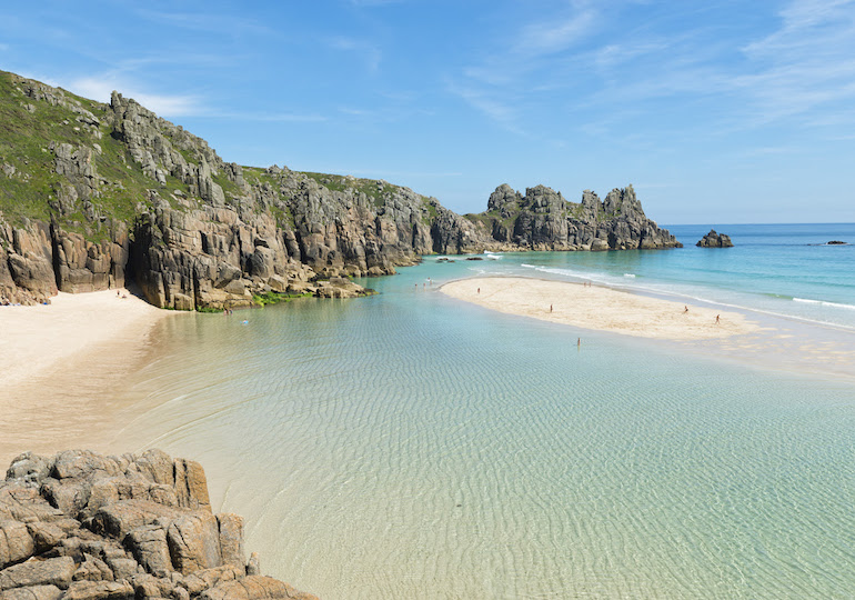 Low tide at Pedn Vounder Beach, South Cornwall on a bright June day.