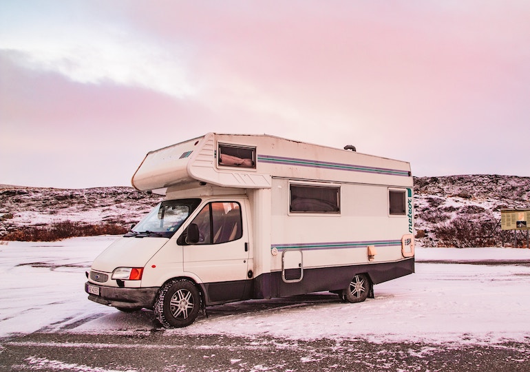 A motorhome parked up in the snow