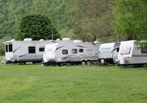 Multiple caravans parked up in a field