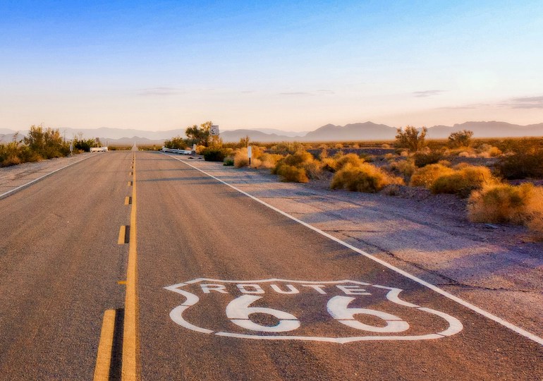 A section of road emblazoned with the Route 66 logo