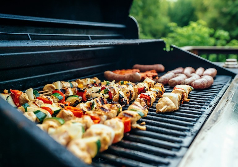 Meat cooking on a BBQ