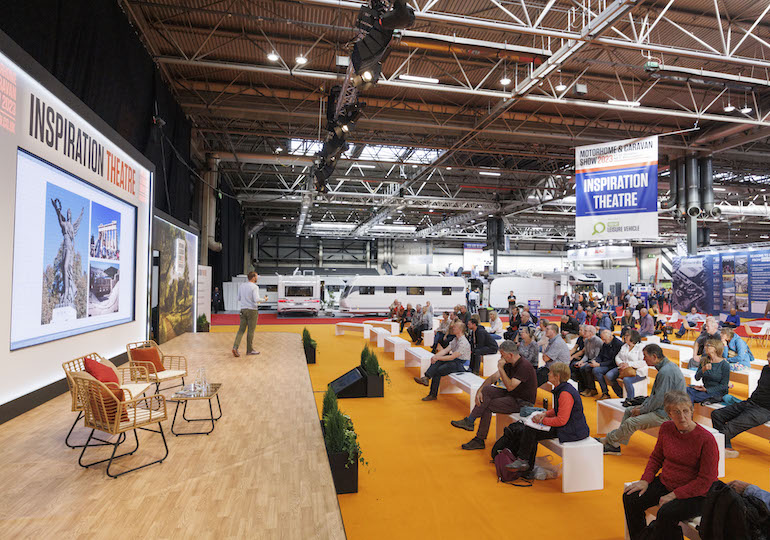 A view of the stage and audience at the Inspiration Theatre